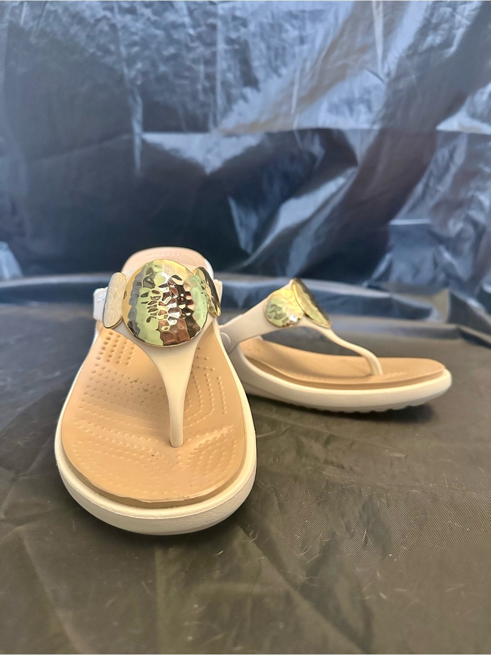 CROCS Women's White Thong Sandals with 3 Gold Disc Accents